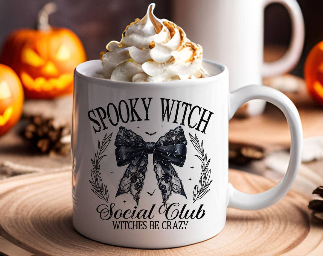 "Spooky Witch Social Club" Halloween design on a white coffee mug