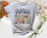 "You Had Me At Vintage Thrifting" design on a heather gray unisex t-shirt