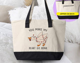 "You Make My Heart Go Honk" design on a natural canvas zippered tote bag
