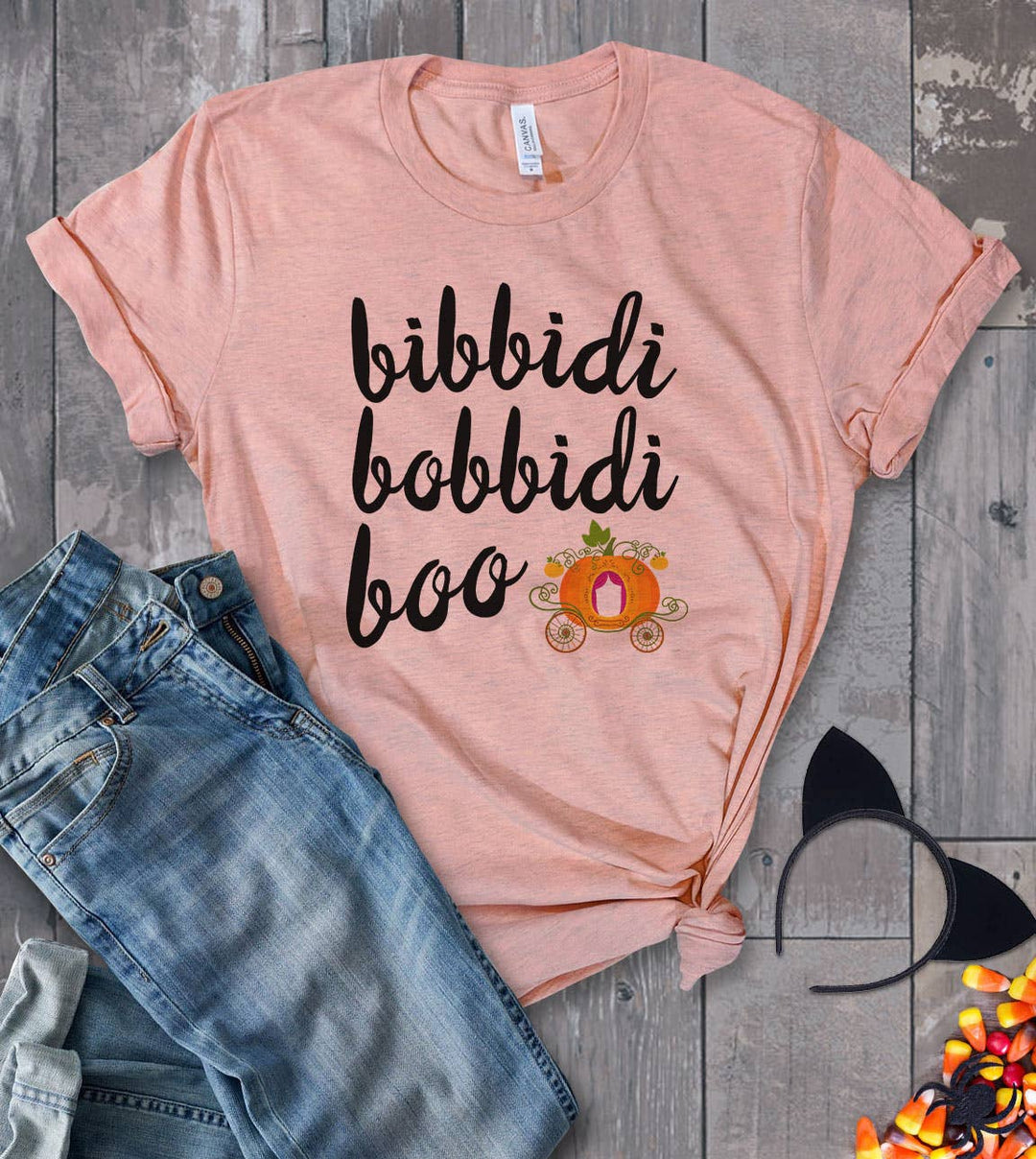 "Bibbidi Bobbidi Boo" design on a peach unisex t-shirt