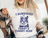 "I Survived Today's Tummy Ache" design on a white unisex t-shirt