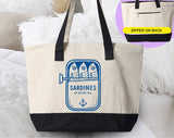 "Sardines Blue Tin Fish" design on a natural canvas zippered tote bag