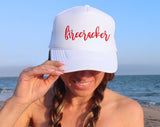 "Firecracker" design on a mesh-back snapback trucker hat