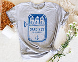 "Sardines Blue Tin" design on a heather gray unisex t-shirt