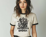 "The Golden Girl Ghouls" design on a natural ringer t-shirt with black contrast trim
