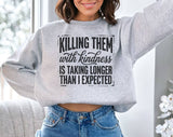 "Killing Them With Kindness" design on an ash gray unisex crewneck sweatshirt