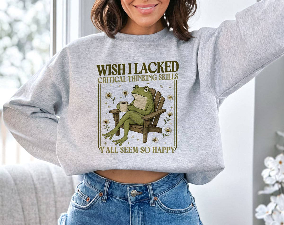 "Wish I Lacked Critical Thinking Funny Frog" design on an ash gray unisex crewneck sweatshirt