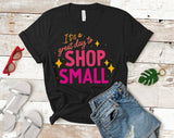 "It's A Great Day To Shop Small" design on a black unisex t-shirt