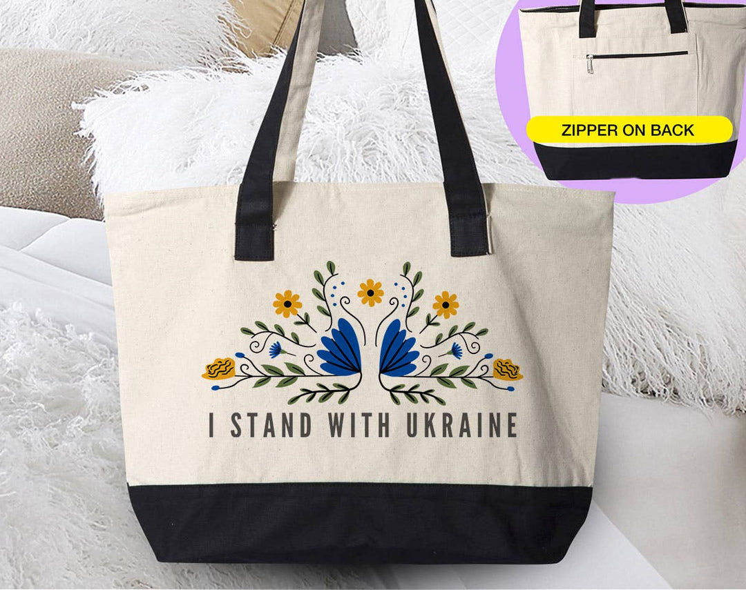 "I Stand With Ukraine" design on a natural canvas zippered tote bag