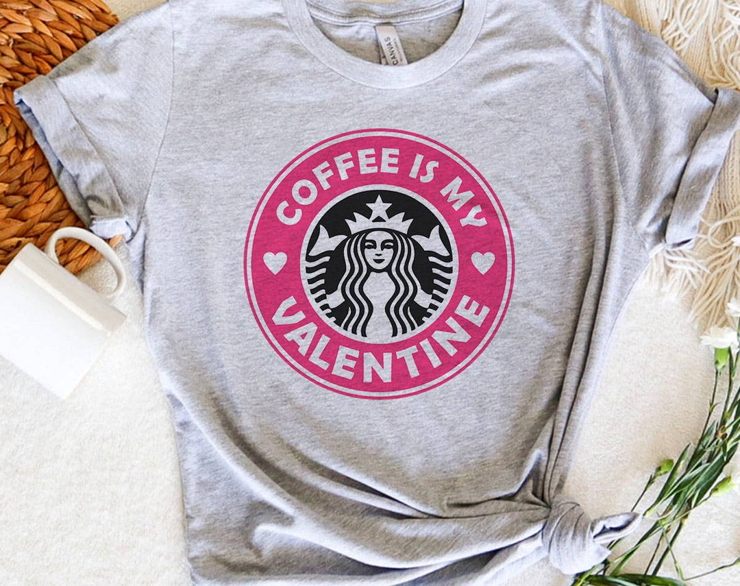 "Coffee Is My Valentine Pink Logo" design on a heather gray unisex t-shirt