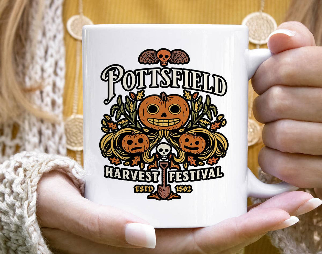 "Pottsfield Harvest Festival" fall design on a white coffee mug