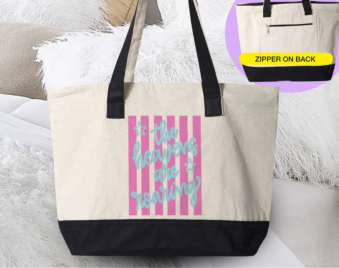 "The Heavens Are Roaring Faith Jesus" design on a natural canvas zippered tote bag