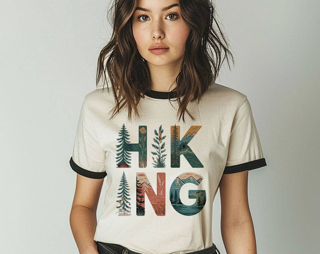"Hiking Tree Nature Drawing" design on a natural ringer t-shirt with black contrast trim