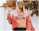 "Stay Spooky Ghost" design on a peach unisex t-shirt