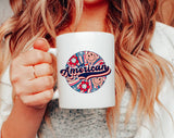 "4th of July American Swirl Flower" design on a white ceramic coffee mug