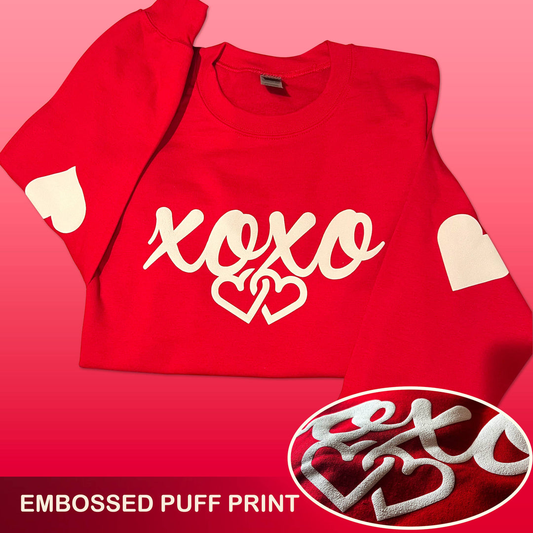 "XOXO Heart Sleeves" design on a red unisex crewneck sweatshirt