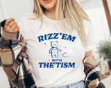 "Rizz 'Em With The 'Tism Bear" design on a white unisex t-shirt