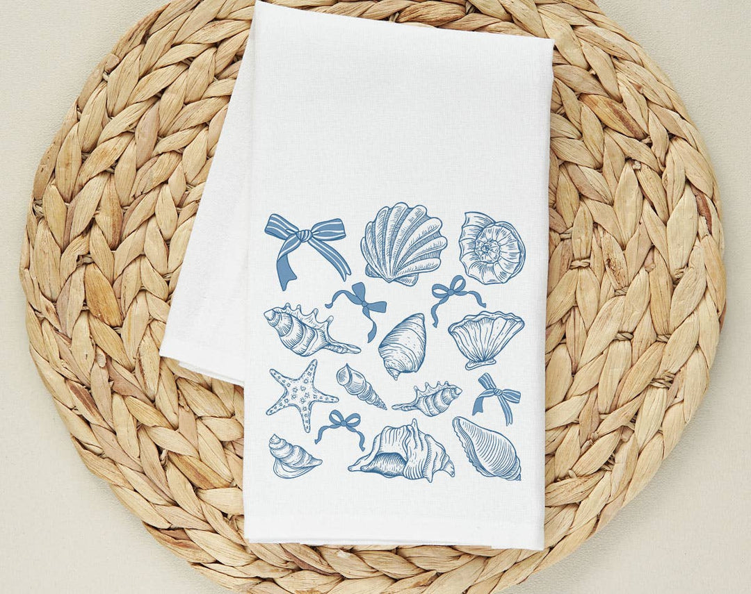 "Seashell Beach Collage" design on a white 28 x 28 inch flour sack tea towel