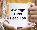 "Average Girls Read Too Hot Girl Trademark Book" design on a white ceramic coffee mug
