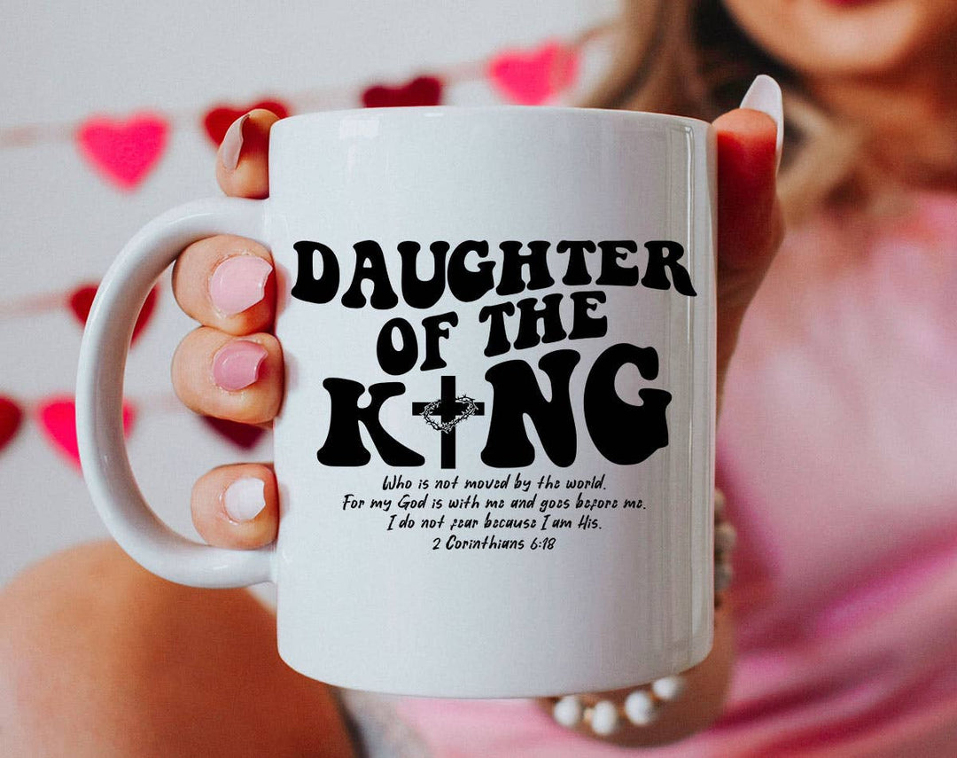 "Daughter Of The King" design on a white ceramic coffee mug