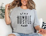 "Stay Humble, Hustle Hard" design on a heather gray unisex t-shirt