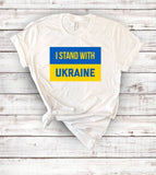 "I Stand With Ukraine Flag" design on a white unisex t-shirt