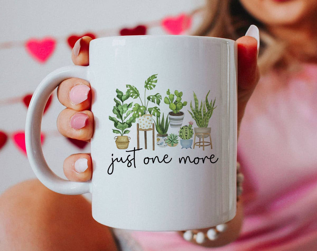 "Just One More Plant" design on a white ceramic coffee mug