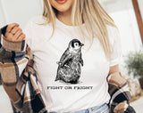"Fight Or Flight Penguin" design on a white unisex t-shirt