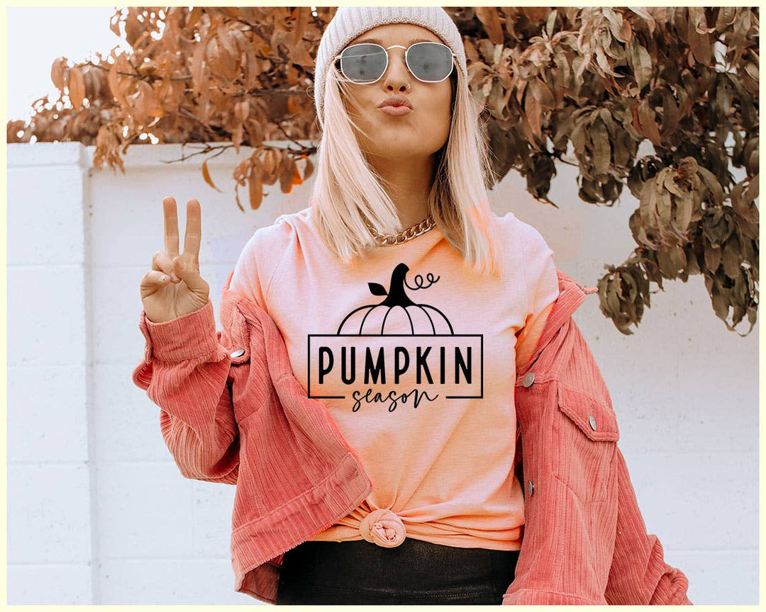 "Pumpkin Season" design on a peach unisex t-shirt