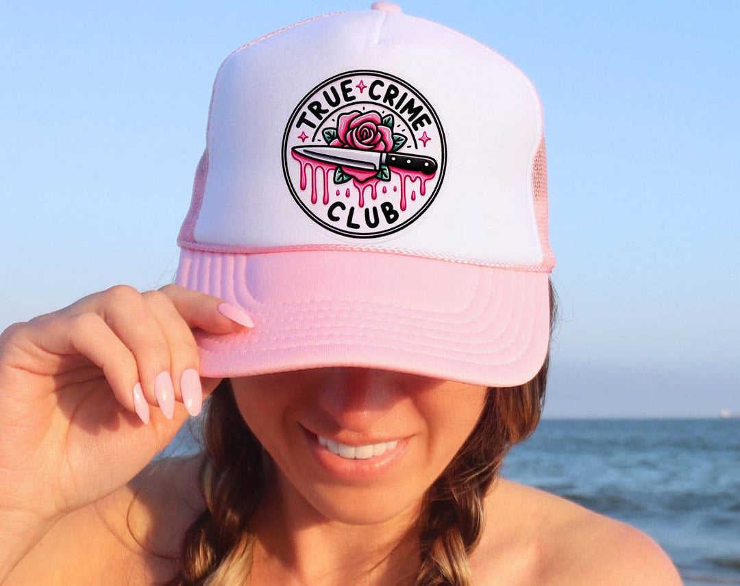 "True Crime Club Rose" design on a mesh-back snapback trucker hat