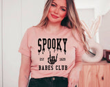 "Spooky Babes Club" design on a peach unisex t-shirt