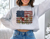 "American Flag Floral Painting" design on an ash gray unisex crewneck sweatshirt