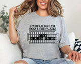 "Solve The Puzzle F*ck Trump" design on a heather gray unisex t-shirt