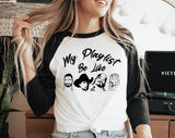 "My Playlist Be Like" design on a white baseball raglan tee with black sleeves