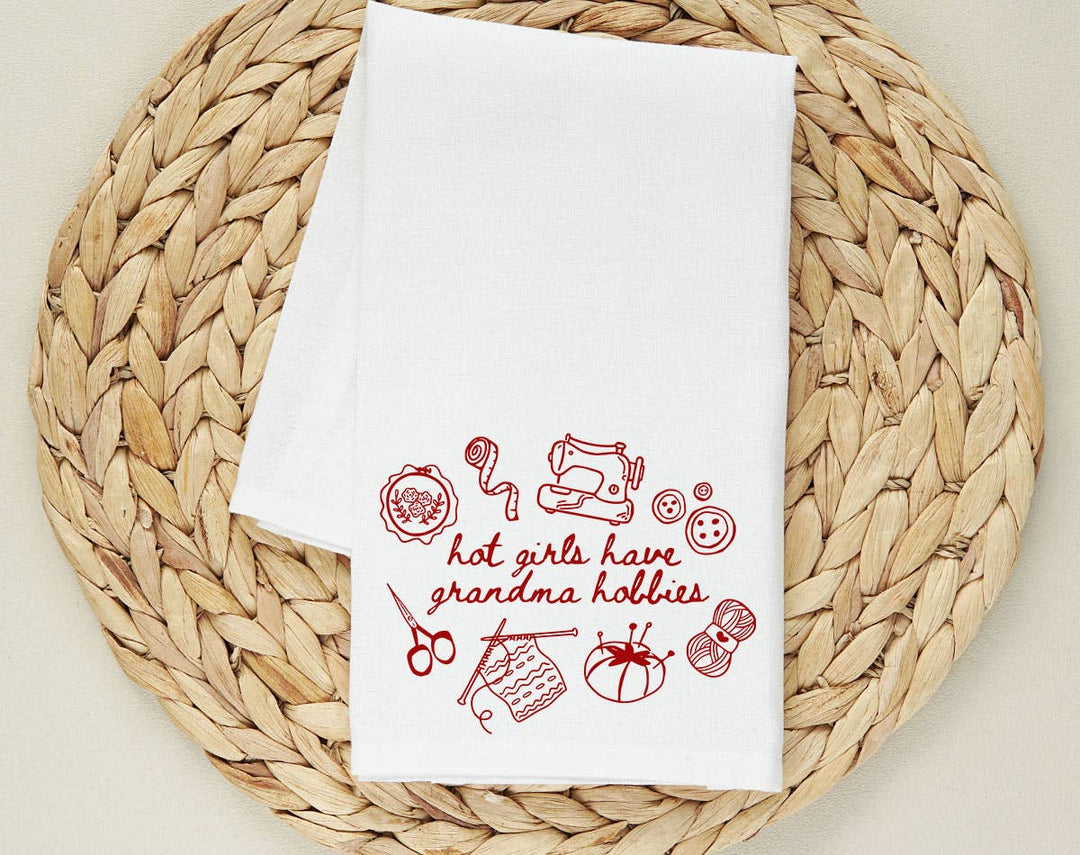 "Hot Girls Have Grandma Hobbies" design on a white 28 x 28 inch flour sack tea towel