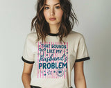 "That Sounds Like My Husband's Problem Striped" design on a natural ringer t-shirt with black contrast trim