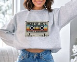 "Best Of 1973" design on an ash gray unisex crewneck sweatshirt