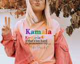 "Kamala Hard To Pronounce, Try Madam President" design on a peach unisex t-shirt