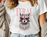 "Feral Vogue Raccoon" design on a white unisex t-shirt