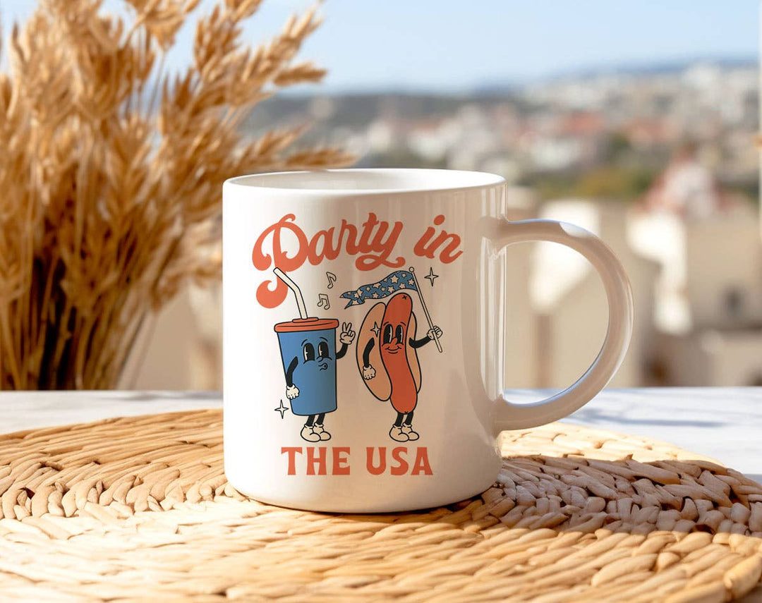 "Party In The USA Hotdog" design on a white ceramic coffee mug