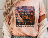 "Bad Day To Be A Hotdog" design on a peach unisex t-shirt