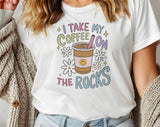 "I Take My Coffee On The Rocks" design on a white unisex t-shirt