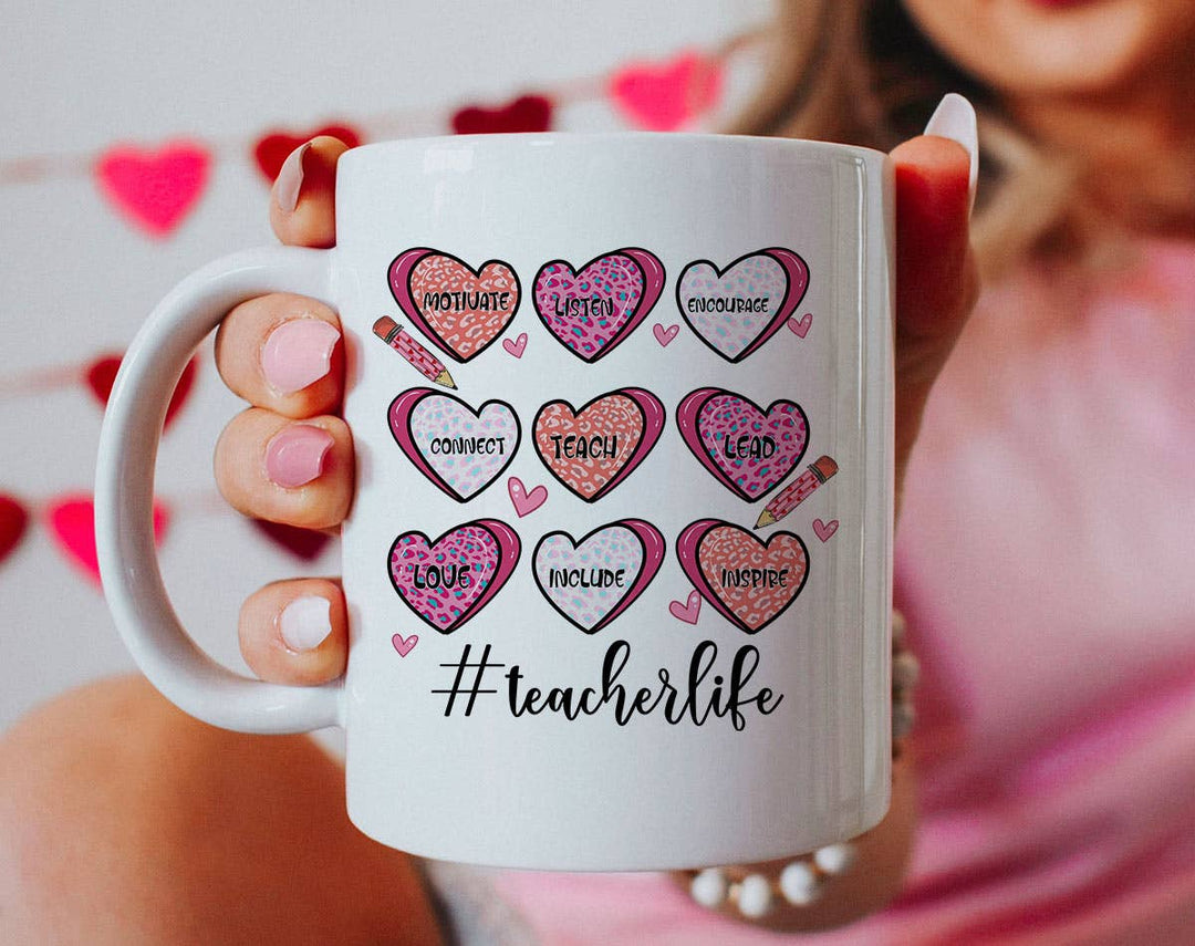 "Teacher Life Hearts" design on a white ceramic coffee mug