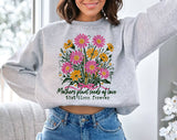 "Mothers Plant Seeds Of Love" design on an ash gray unisex crewneck sweatshirt