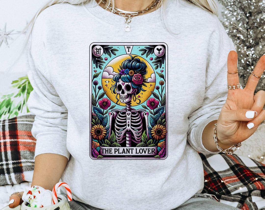 "The Plant Lover Tarot Full Color" design on an ash gray unisex crewneck sweatshirt