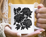 "Retro Linocut Black Peonies Floral" design on a white ceramic coffee mug