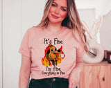 "It's Fine Everything Is Fine Dog" design on a peach unisex t-shirt