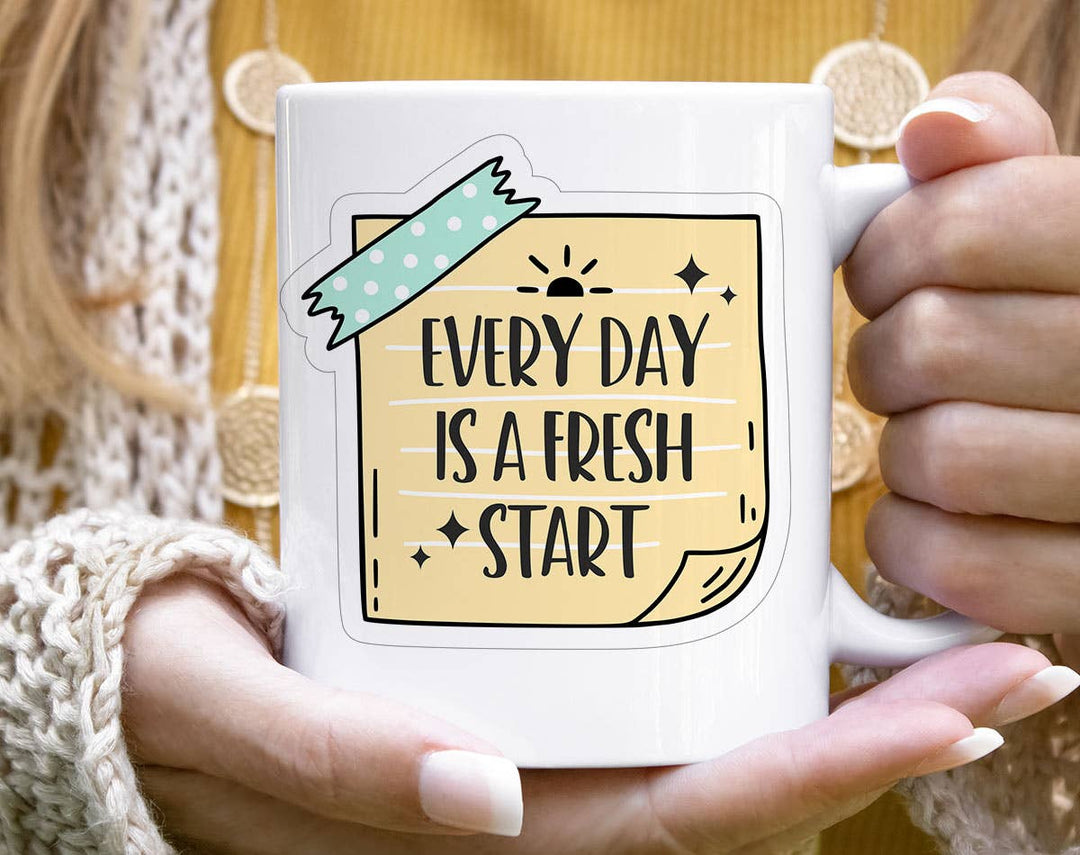 "Every Day Is A Fresh Start" design on a white ceramic coffee mug