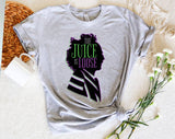 "The Juice Is Loose" design on a heather gray unisex t-shirt