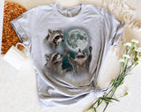 "3 Raccoons Howling At The Moon" design on a heather gray unisex t-shirt